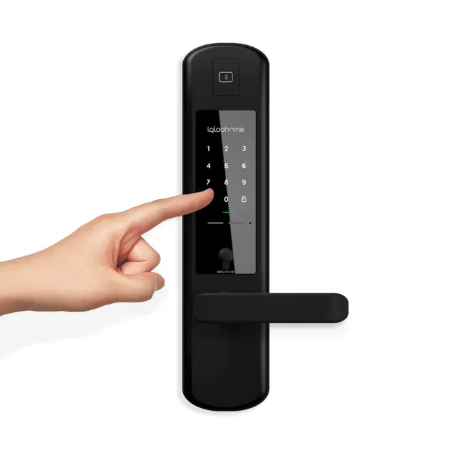 igloohome Smart Mortise 2 - 9 - Black keypad interface with numeric buttons and green indicator light., Human finger