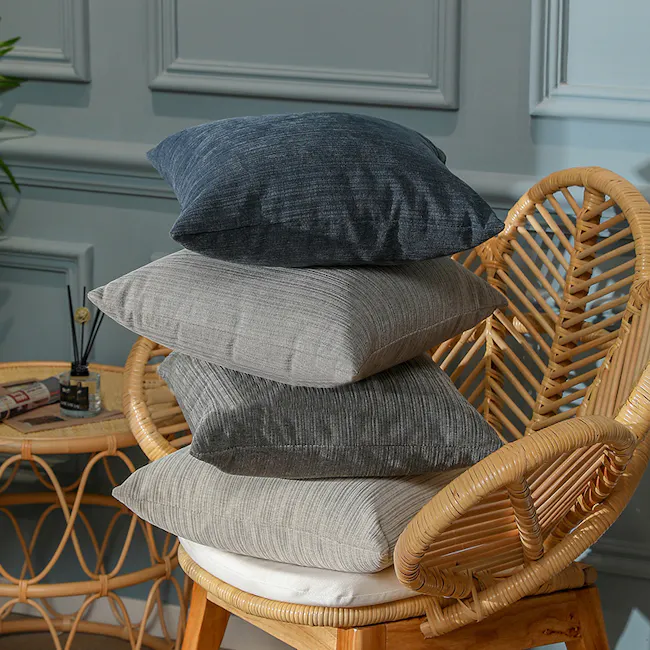 Minnesota Cushion Cover - Light Grey - 6 - Wicker chair, gray and blue pillows, stacked pillows, indoor setting, cozy