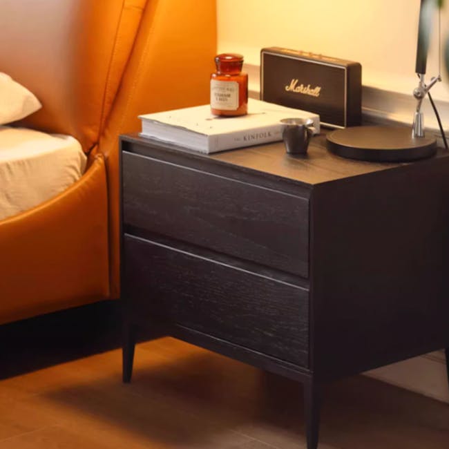 Noir Bedside Table - 6 - Orange leather bed frame, black nightstand, vintage marshall amplifier, stack of books, small jar