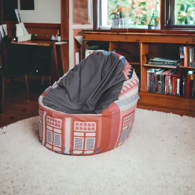Doob Oomph - Herritage Collection - Shophouses - 7 - Round cushion with colorful design, gray fabric partially covering