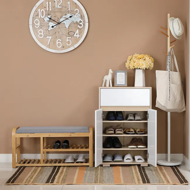 Maren Shoe Cabinet - 3 - Wooden bench, beige wall, striped rug, wooden shelf, shoes, socks, white hat, white bag, yellow