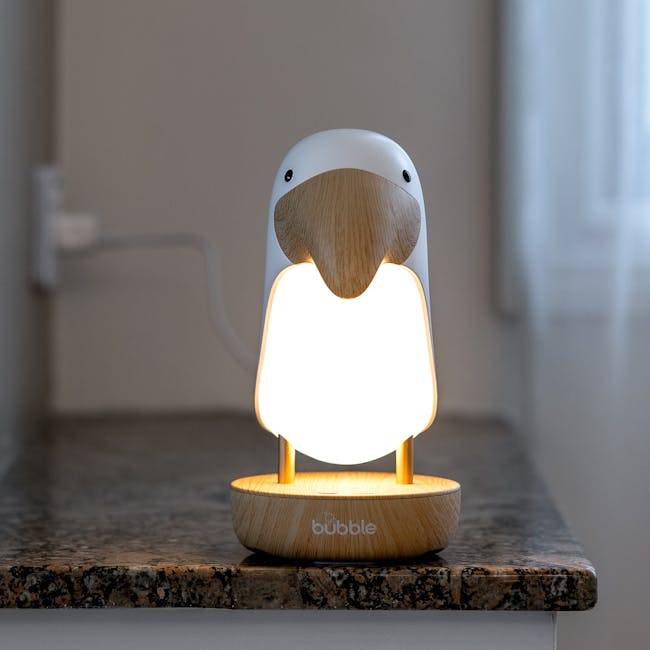 Bubble Toucan Night Light - 7 - Wooden bird-shaped lamp, glowing white light, minimalist design, modern aesthetic, smart