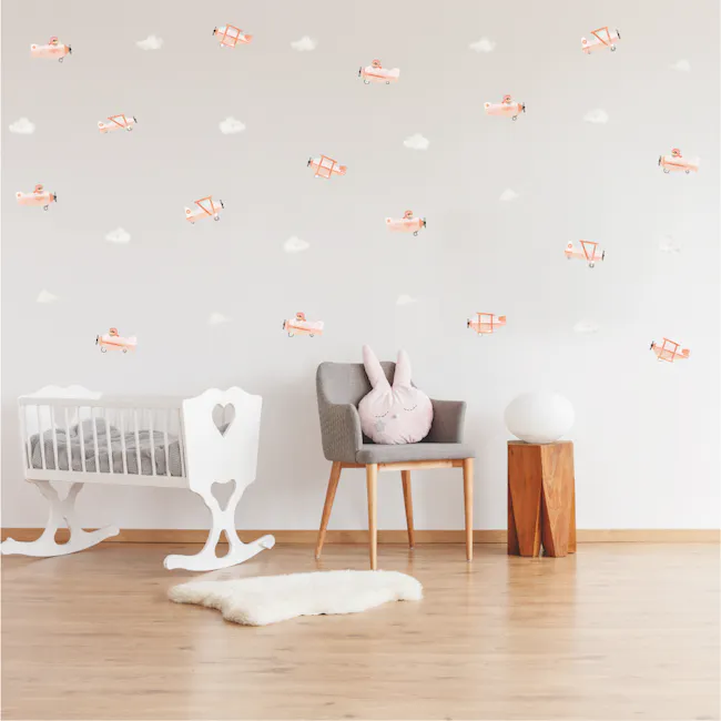 Urban Li'l Adventure Skies Fabric Decal - Vintage Planes - 2 - Baby room with white crib, gray chair with bunny pillows