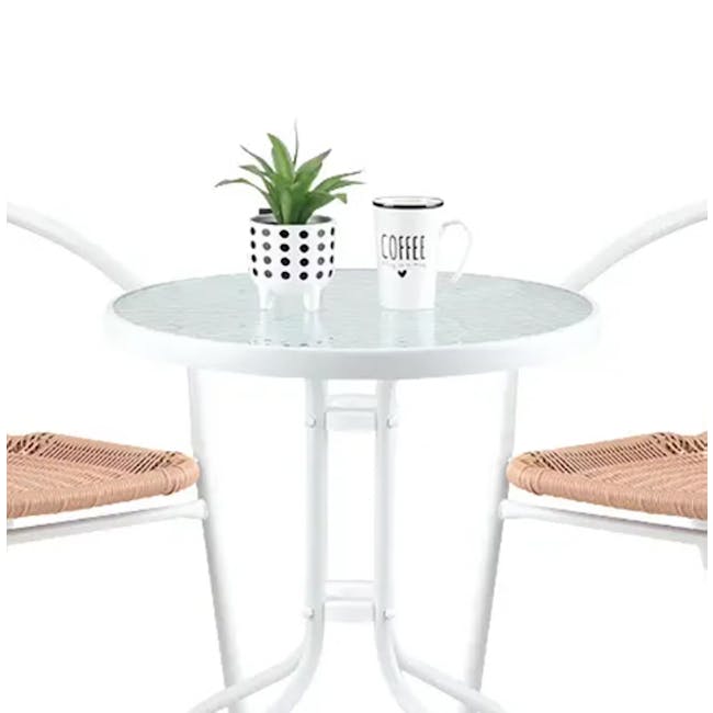 Tatum Outdoor Set - 8 - White round table, minimalist design, two chairs, woven seat, potted plant, black and white polka