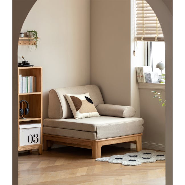 Zara Sofa Bed - Gravel White - 10 - Modern minimalist living room, cozy seating area, beige sofa, wooden bookshelf