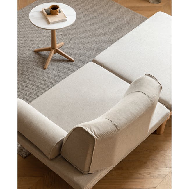 Zara Sofa Bed - Gravel White - 12 - Modern minimalist sofa, beige fabric, wooden legs, cozy seating area, soft lighting