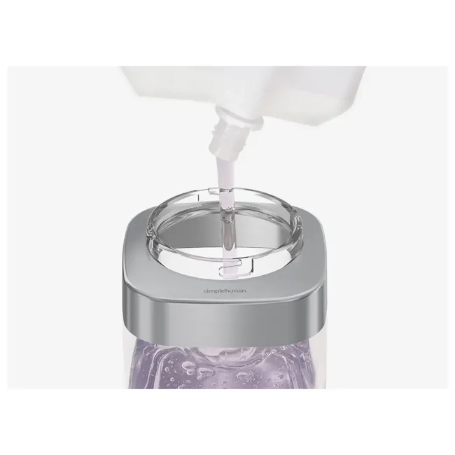simplehuman 15oz Push Pump - 4 - Clear glass jar, white liquid, pouring bottle, silver lid, purple liquid, cosmetic bottle