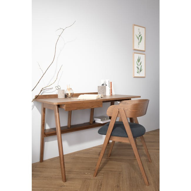 Melda Dining Armchair - Cocoa, Navy - 3 - Modern minimalist desk, wooden chair, natural light, clean lines, abstract art