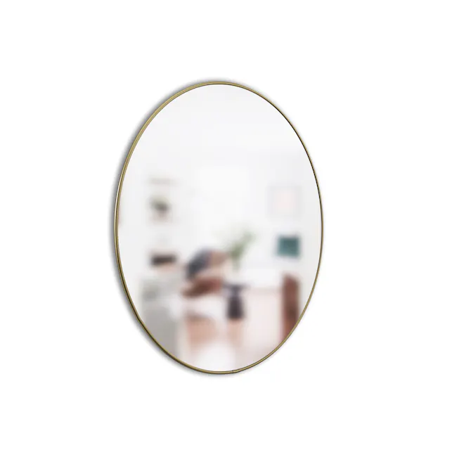 Hubba Round Mirror 86 cm - Brass - 3 - Gold-framed mirror, blurred interior, modern decor, minimalist design, round shape