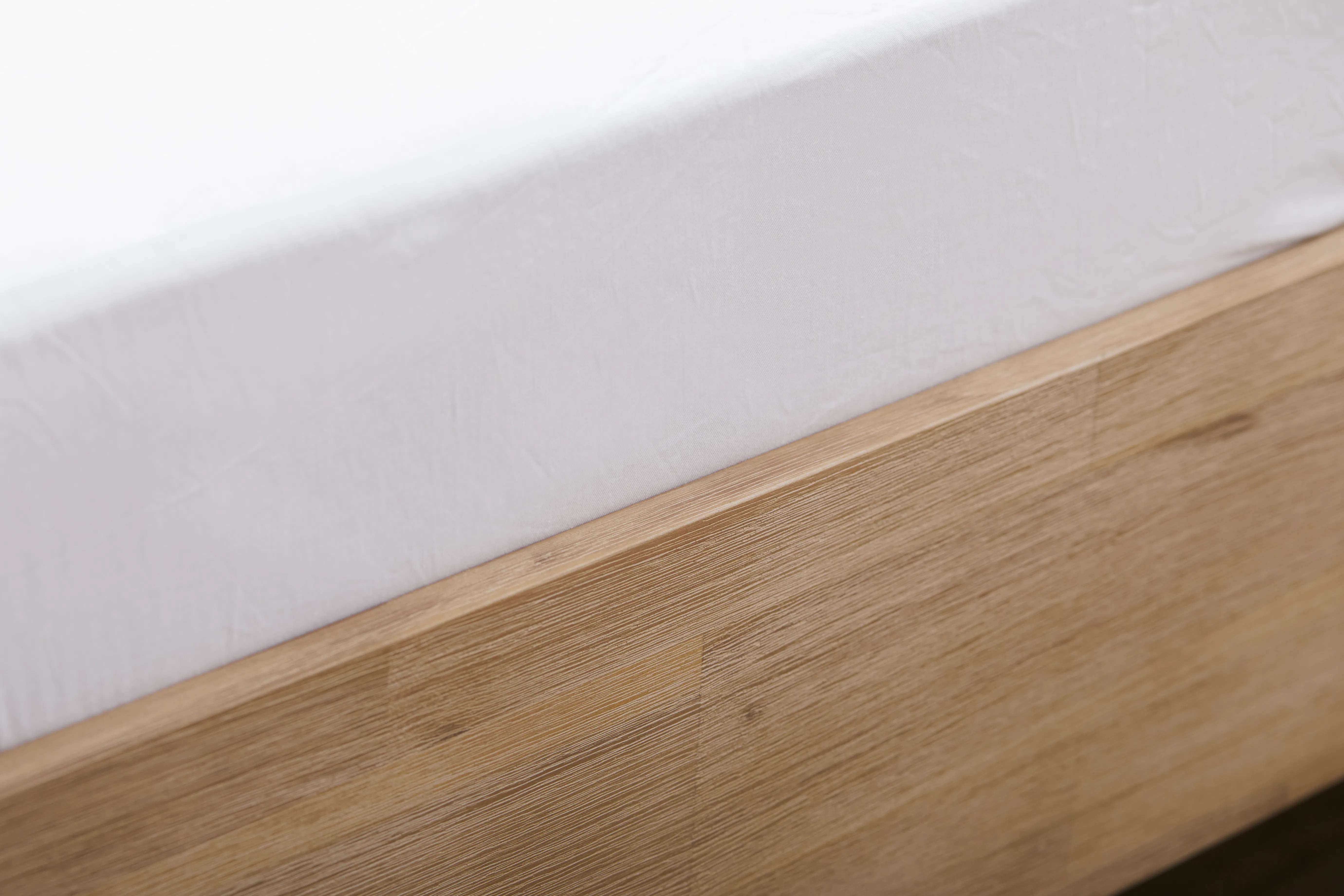 Catania Queen Bed - 16 - White bed sheet, wooden frame, minimalist design, natural wood grain, soft lighting, cozy