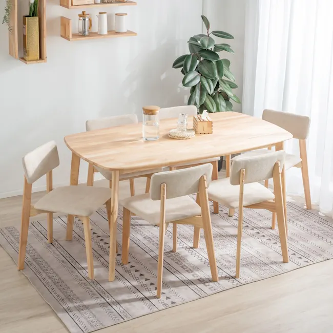 Hockey Chair - Grey - 5 - Wooden dining table, minimalist design, light beige chairs, natural wood finish, cozy dining room