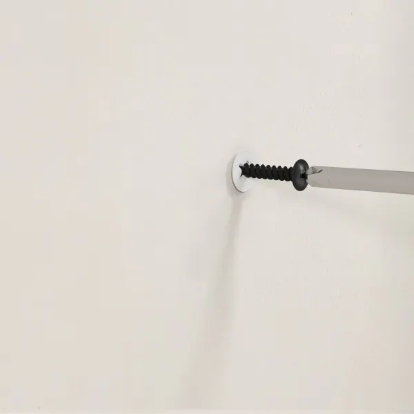 Room setting featuring Geo Pin-Point Curtain Rod - Matte Black