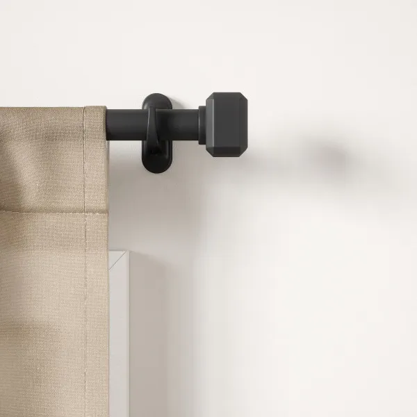 Room setting featuring Geo Pin-Point Curtain Rod - Matte Black
