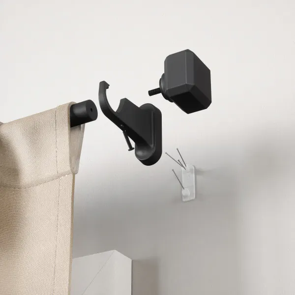 Room setting featuring Geo Pin-Point Curtain Rod - Matte Black