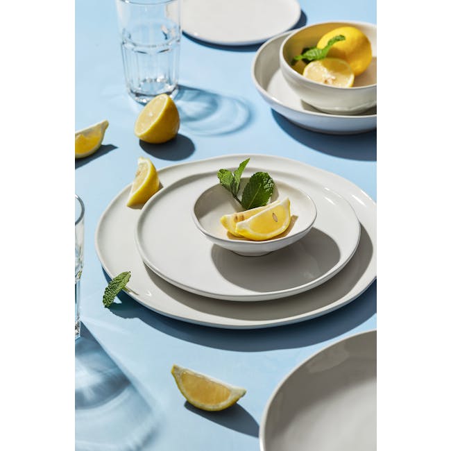 Luzerne Ripple Plate - White Dew (4 Sizes) - 2 - Clear glass, lemon slices, mint leaves, white plates, blue tablecloth