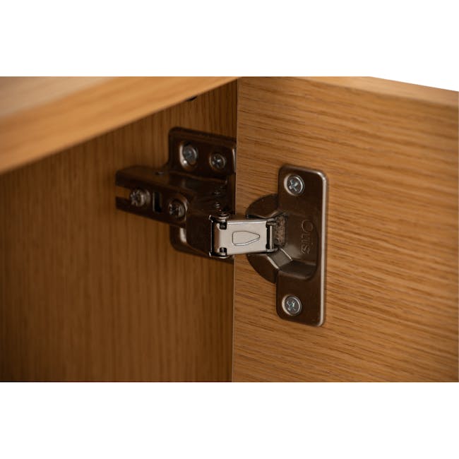 Dayne Rattan Coffee Table - 13 - Wooden cabinet hinge, metal hardware, sturdy construction, secure locking mechanism