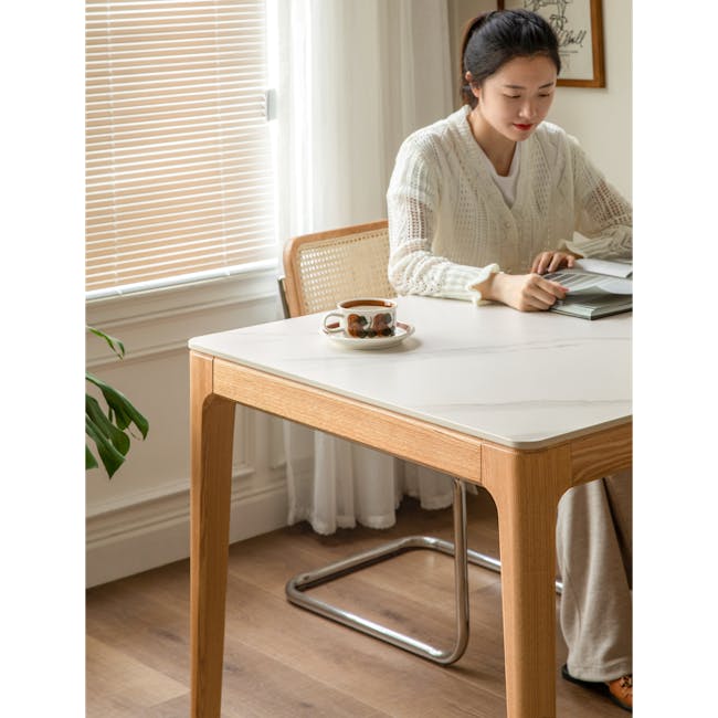 Adelyn Dining Table 1.6m (Sintered Stone) with 4 Niel Chairs in Oak - 21 - White knit sweater, light wooden table, green