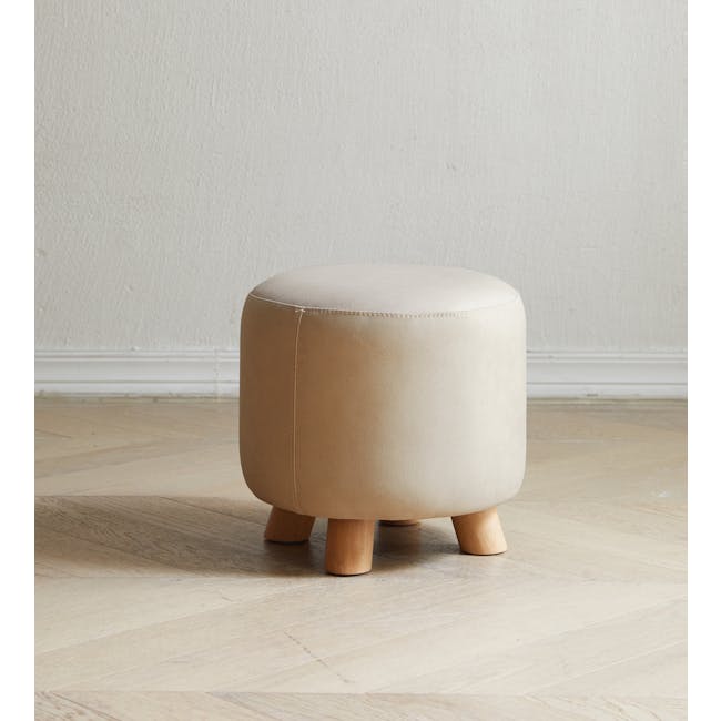 Niyo Stool - Cream - 9 - Cream upholstered stool, minimalist design, wooden legs, light hardwood floor, soft natural light
