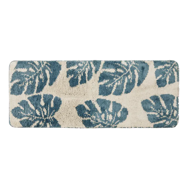 Tropical Runner Rug - Monstera - 1 - Floral-patterned rug with deep blue leaves and beige background, rectangular shape