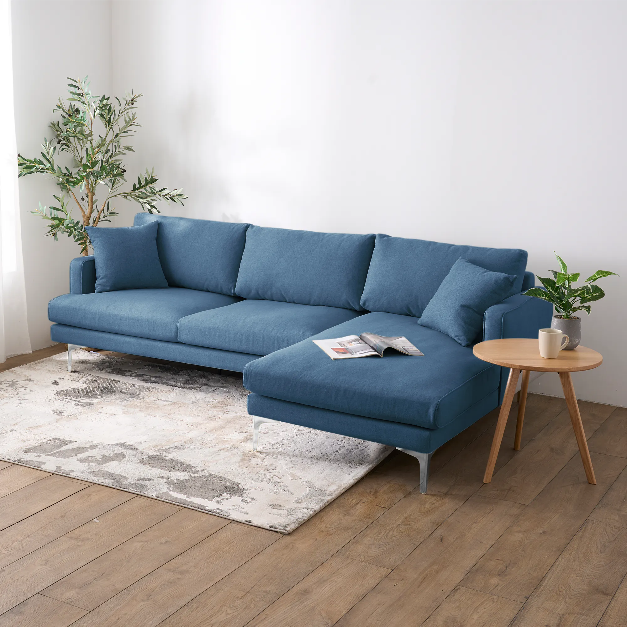 Declan L-Shaped Sofa - Walnut, Blue - 34 - Modern living room, cozy sofa, blue fabric, wooden floor, light gray rug, white