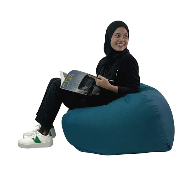 Rey Bean Bag - Grey - 3 - black hijab, blue bean bag, smiling woman, indoor setting, casual attire, white sneakers, green