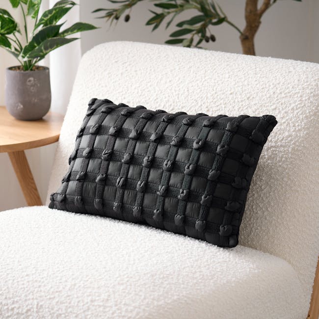 Dainie Textured Puffed Grid Lumbar Cushion - Black - 2 - Black textured cushion, white textured sofa, potted plant, wooden
