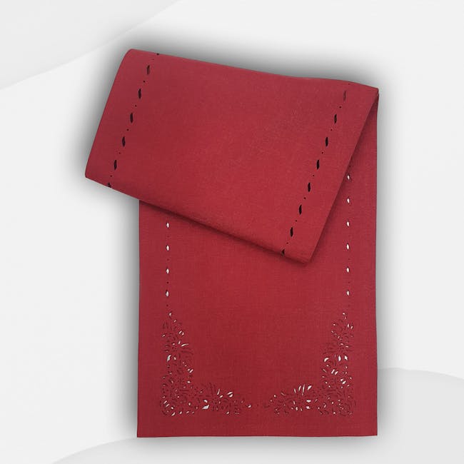 RAPEE Jardin Table Runner - Red - 5 - Red fabric with decorative cutouts, elegant floral lace design, textured surface, rich