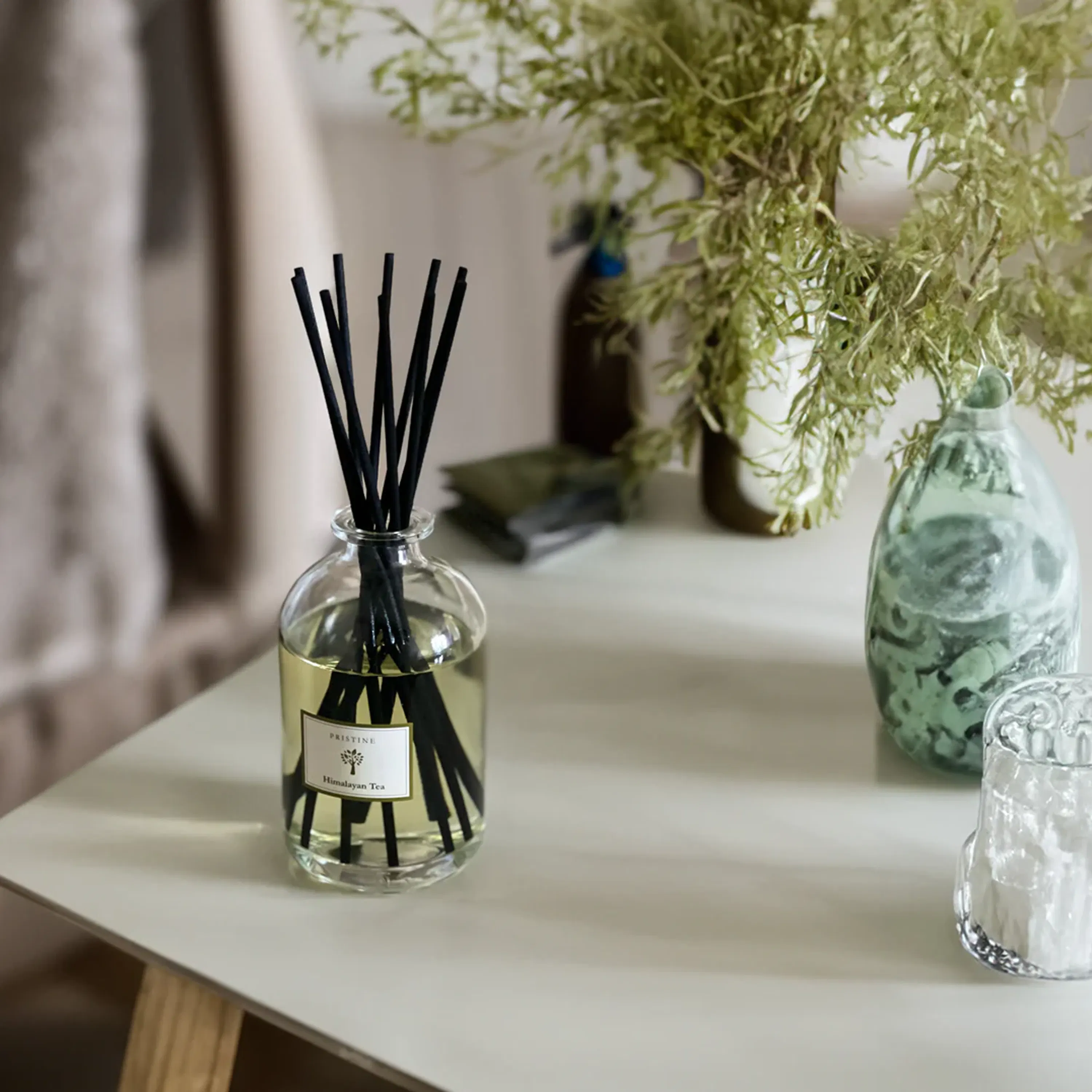 Pristine Aroma  Reed Diffuser - Himalayan Tea (3 Sizes) - 11 - Glass jar with black essential oil sticks, clear liquid