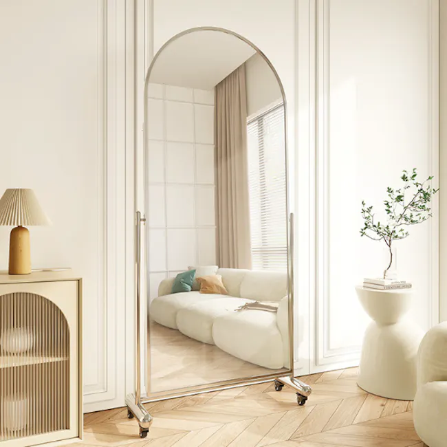 Vega Arched Movable Mirror - Silver - 2 - Modern minimalist living room, large mirror, white walls, cozy seating area, soft
