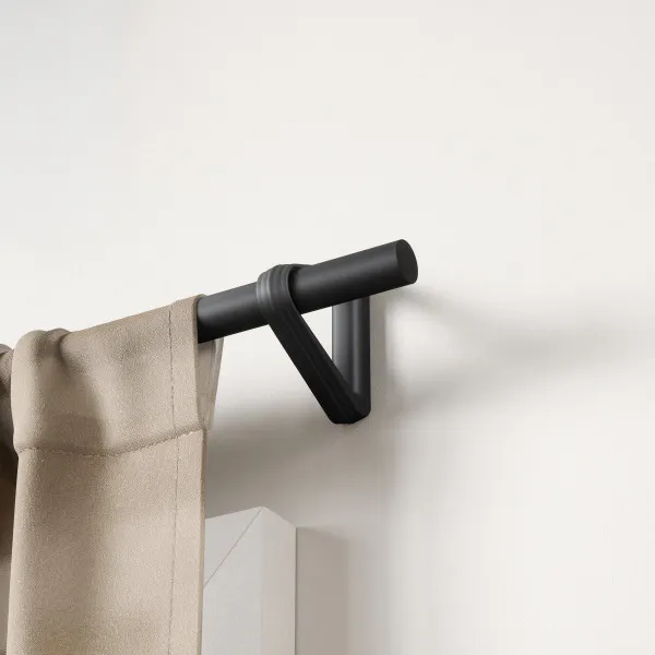 Room setting featuring Trinity Pin-Point Curtain Rod - Matte Black
