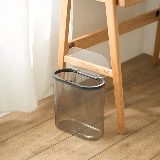 Vero Fluted Acrylic Bin with Lid - Grey - 2 - Wooden chair, wooden floor, transparent trash can, wooden legs, wooden wall