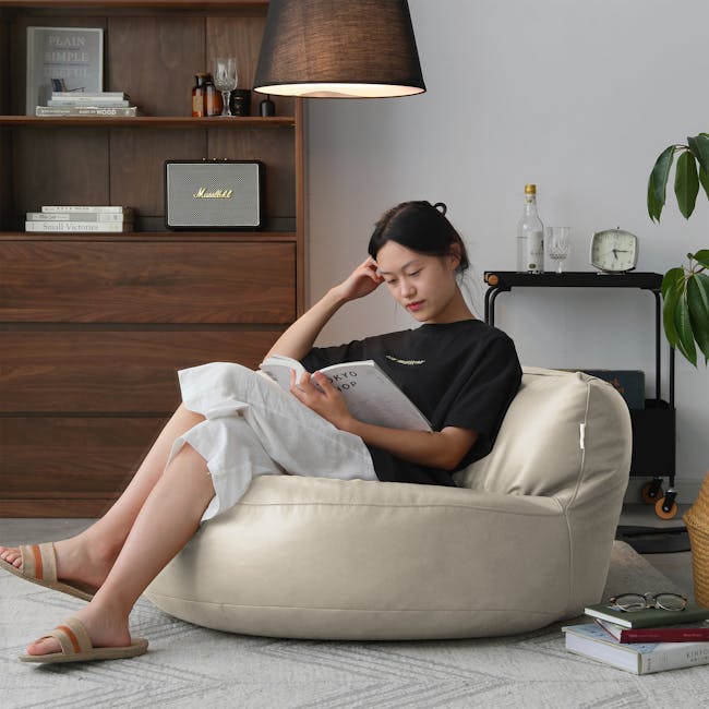 August Round Bean Bag - Rice White (Faux Leather) - 2 - Wooden bookshelf, minimalist decor, black and white lamp, white and