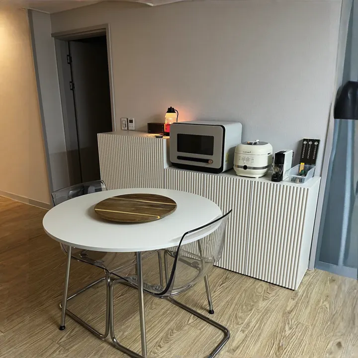 Heidi Tall Cabinet 1.2m - White - 16 - Modern kitchen setup, compact dining area, white round table, transparent chairs