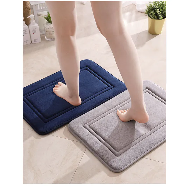 Lexi Bath Mat - Navy - 4 - blue bath mat, gray bath mat, person standing, barefoot, indoor setting, light-colored floor