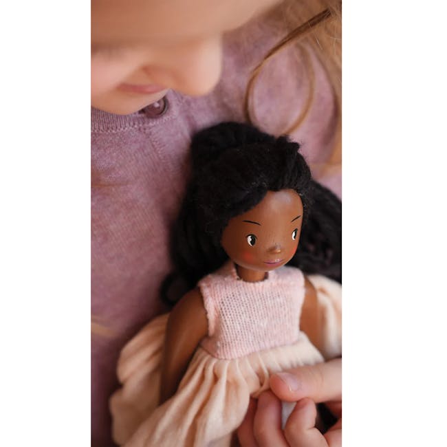 Tender Leaf Lola Wooden Doll - 5 - doll, child, black hair, pink dress, hand holding, soft fabric, gentle expression