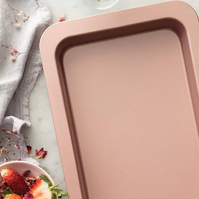 Wiltshire Rose Gold Slice Pan - 3 - Minty pink rectangular baking tray, rustic woven cloth, fresh strawberries, autumn