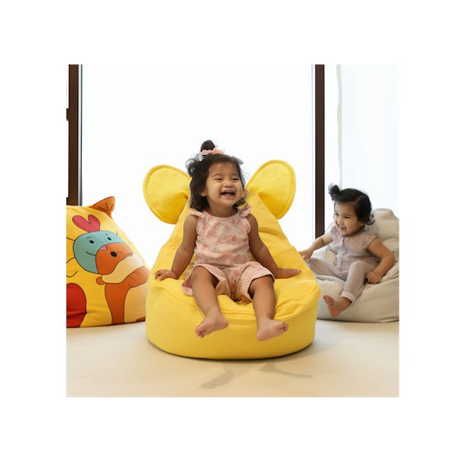 Eddy Bean Bag - Yellow - 9 - Yellow bean bag chair, child sitting, colorful pillow, cartoon animal print, playful