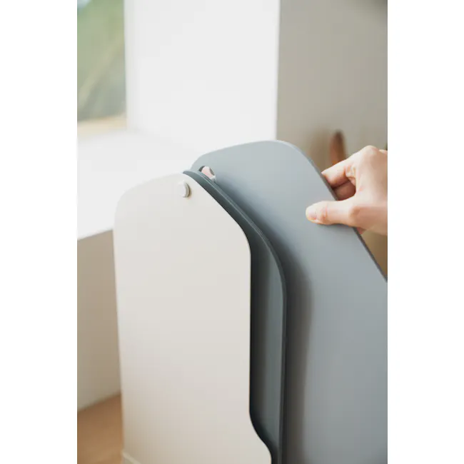 Modori Cutting Board - Warm Pink - 11 - Modern desk, ergonomic chair, adjustable armrest, person's hand, holding chair