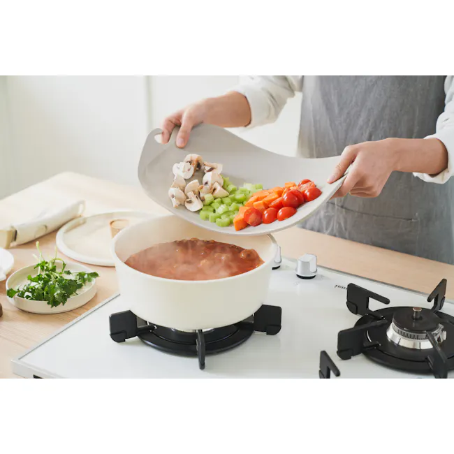 Modori Cutting Board - Warm Pink - 7 - white plate, mushrooms, green celery, orange carrots, red cherry tomatoes, white pot