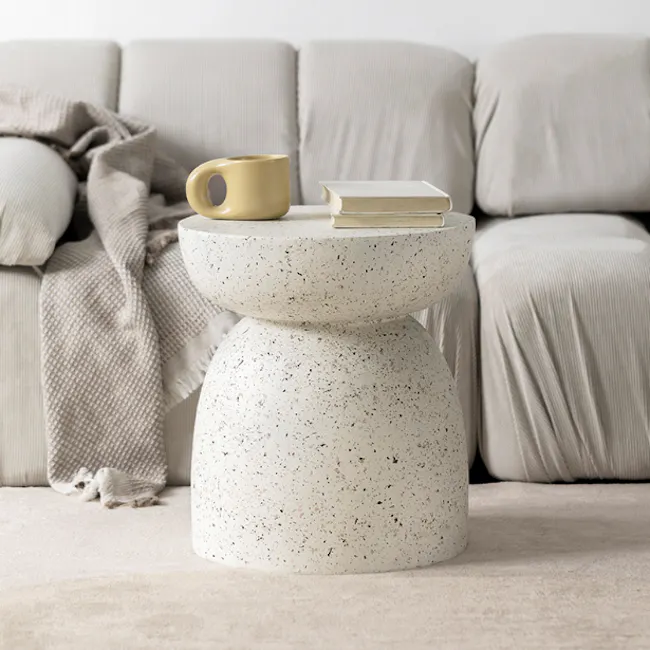 Elara Terrazzo Side Table - 3 - Couch, coffee table, textured surface, beige sofa, cozy living room, soft lighting, modern