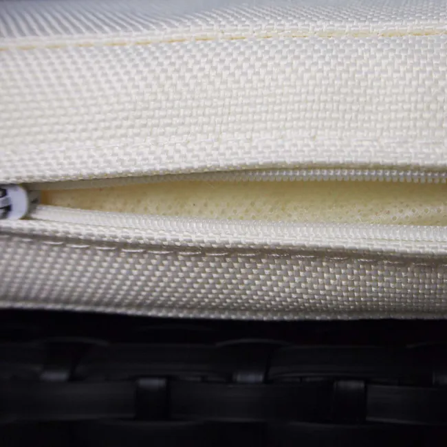 Horizon Patio Set - Cream Cushion - 6 - White fabric zipper, textured surface, fine weave, zipper pull, black suitcase
