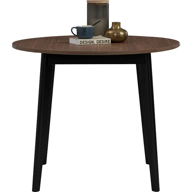 Oliver Extendable Dining Table 0.6m-0.9m - 3 - Round wooden table, minimalist design, black metal legs, coffee mug, book