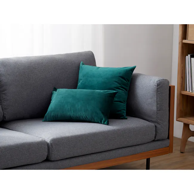 Alyssa Velvet Lumbar Cushion - Emerald - 2 - Modern gray sofa with two green velvet pillows, minimalist interior design