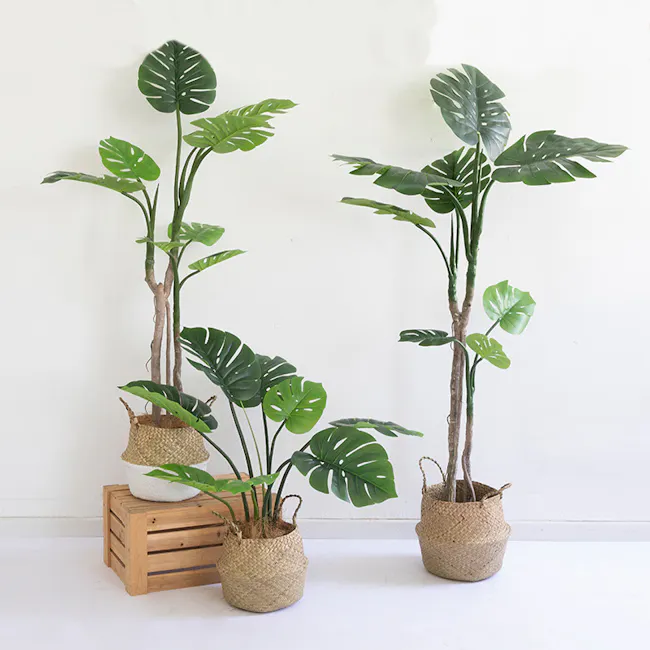 Potted Faux Monstera Plant 90 cm - 2 - Green potted plants with unique leaf patterns, natural woven baskets, minimalist