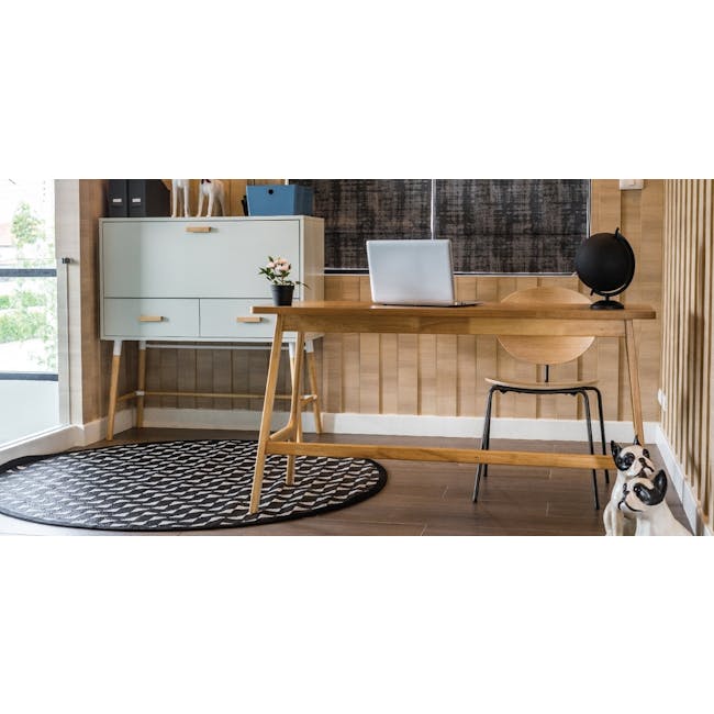 Morey Study Table 1.4m - Natural, Penny Brown - 3 - Wooden desk, laptop, black and white rug, light blue cabinet, black