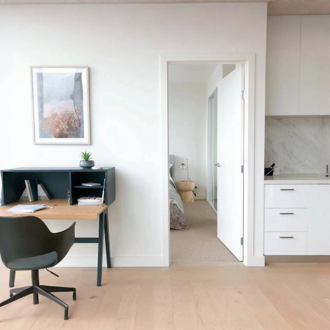 Valen Study Table 0.9m - Space Blue - 2 - Modern minimalist home office, sleek black desk, contemporary furniture, open door