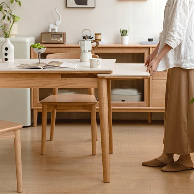 Fidela Extendable Dining Table 0.9m-1.5m (Sintered Stone) - 2 - Wooden dining table, minimalist decor, person standing