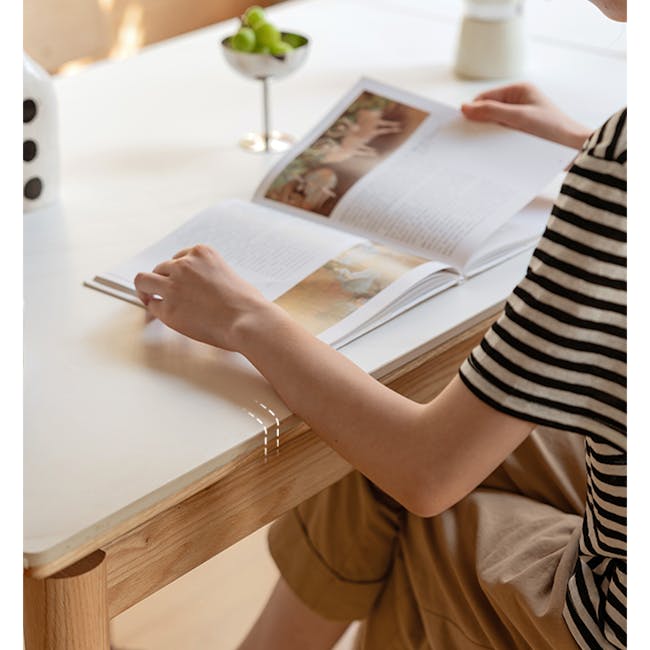 Fidela Extendable Dining Table 0.9m-1.5m (Sintered Stone) - 3 - reading book, open book, person reading, hands holding book