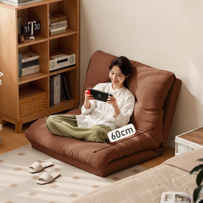 Jesse Sofa Bed - Brown Corduroy - 3 - Brown recliner, 60cm cushion, person relaxing, gaming console, white shirt, green