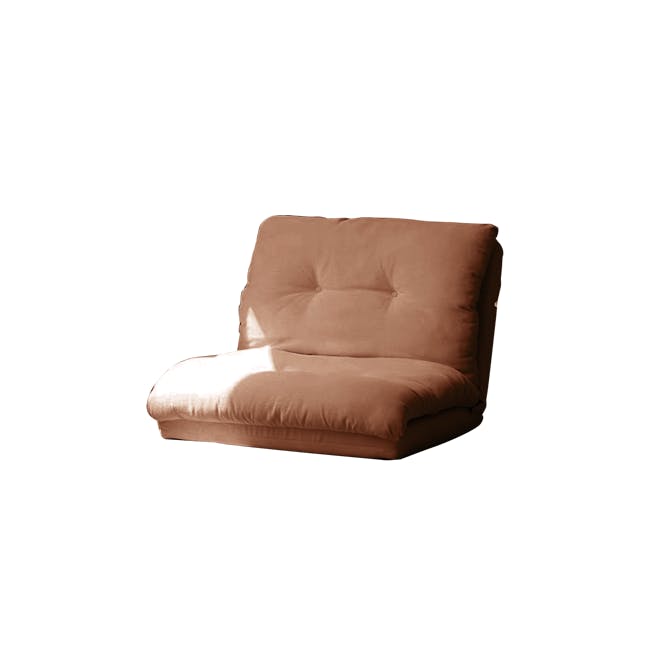 Jesse Sofa Bed - Brown Corduroy - 1 - Soft beige upholstered armchair, warm lighting, cozy interior, comfortable seating